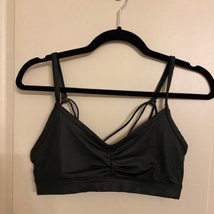 Black Glossy Strappy Sports Bra from ALO Yoga
